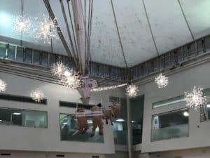 A close-up of decorative bears on a ski lift with twinkling fairy lights at the Eurotunnel Folkestone terminal, adding magic to the journey to Disneyland Paris by Eurotunnel.