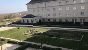 A landscaped garden view from the Grand Magic Hotel near Disneyland Paris, perfect for visitors arriving by Eurotunnel.