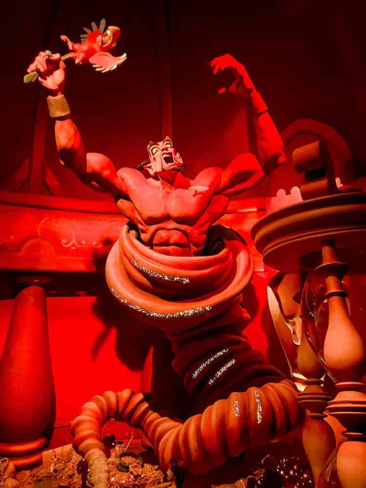 Evil Jafar in genie form lit up in red, one of the unique attractions Disneyland Paris has that the USA parks don't