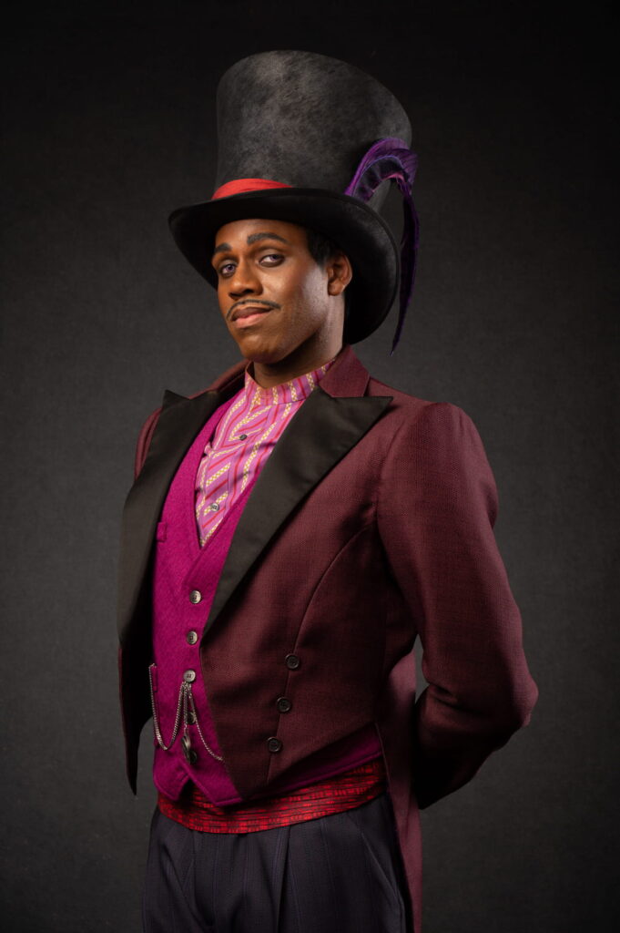 Close-up of Doctor Facilier meeting guests during Halloween at Disneyland Paris 2026, showcasing his detailed costume, signature top hat and mischievous expression from The Princess and the Frog.