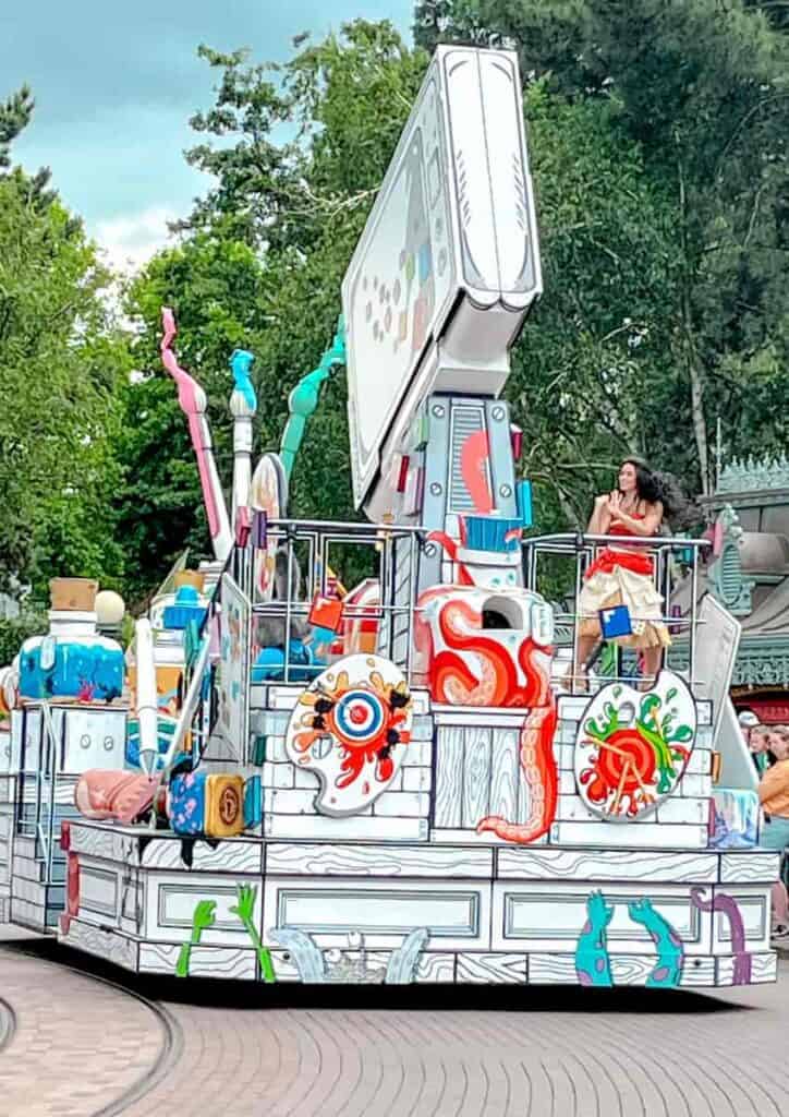 Moana in Polynesian costume dances on a float for Disneyland Paris 'A Million Splashes of Colour' parade