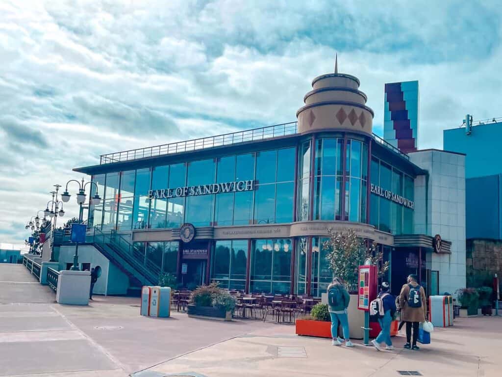 A 2-story glass building is home to Earl of Sandwich, budget-friendly sandwiches and hot food
