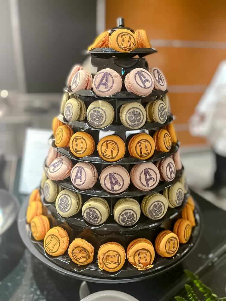 A tower of macarons decorated with Avenger superhero motifs