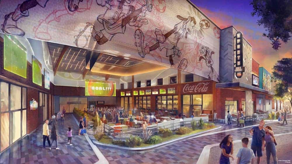 Artist rendering of the redesigned Sports Bar & Lounge at Disneyland Paris, showing a lively outdoor terrace with guests dining and watching sports on large screens, set against a modern Coca-Cola-branded building with animated Goofy sports sketches on the upper wall.