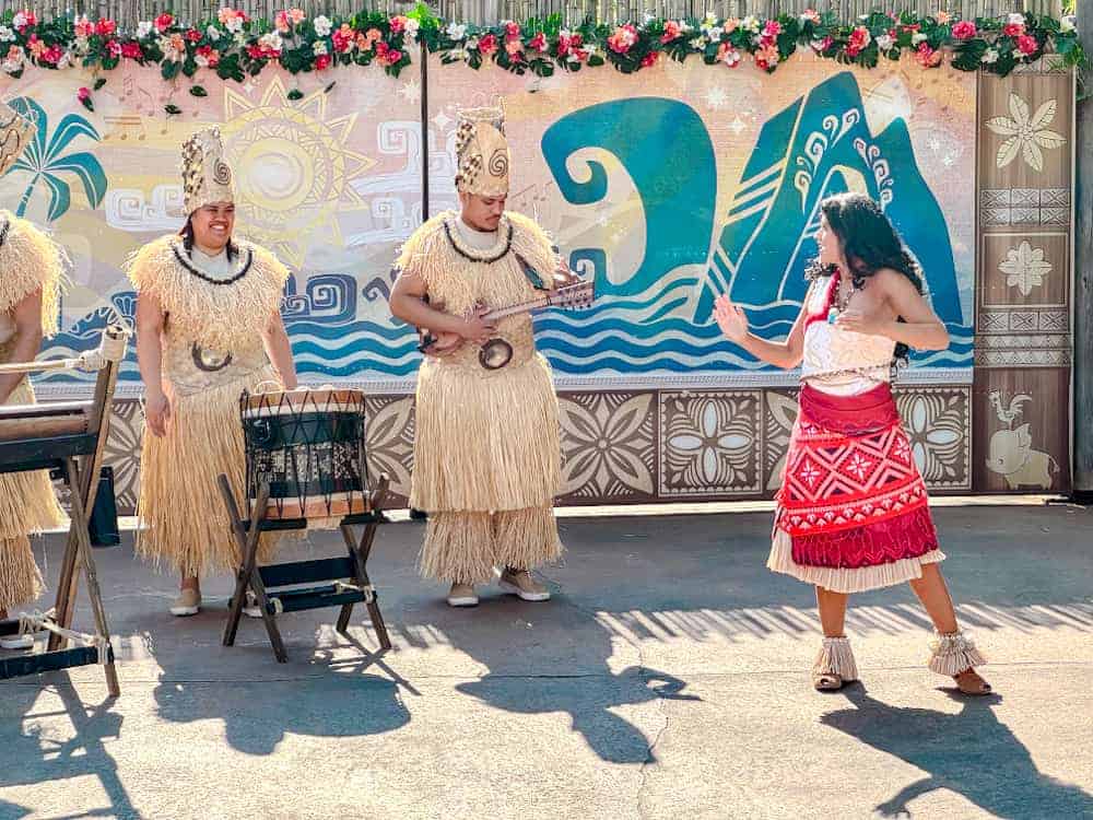 Moana and live musicians performing at Disneyland Paris during the Disney Music Festival. A highlight for fans of character shows and cultural flair.