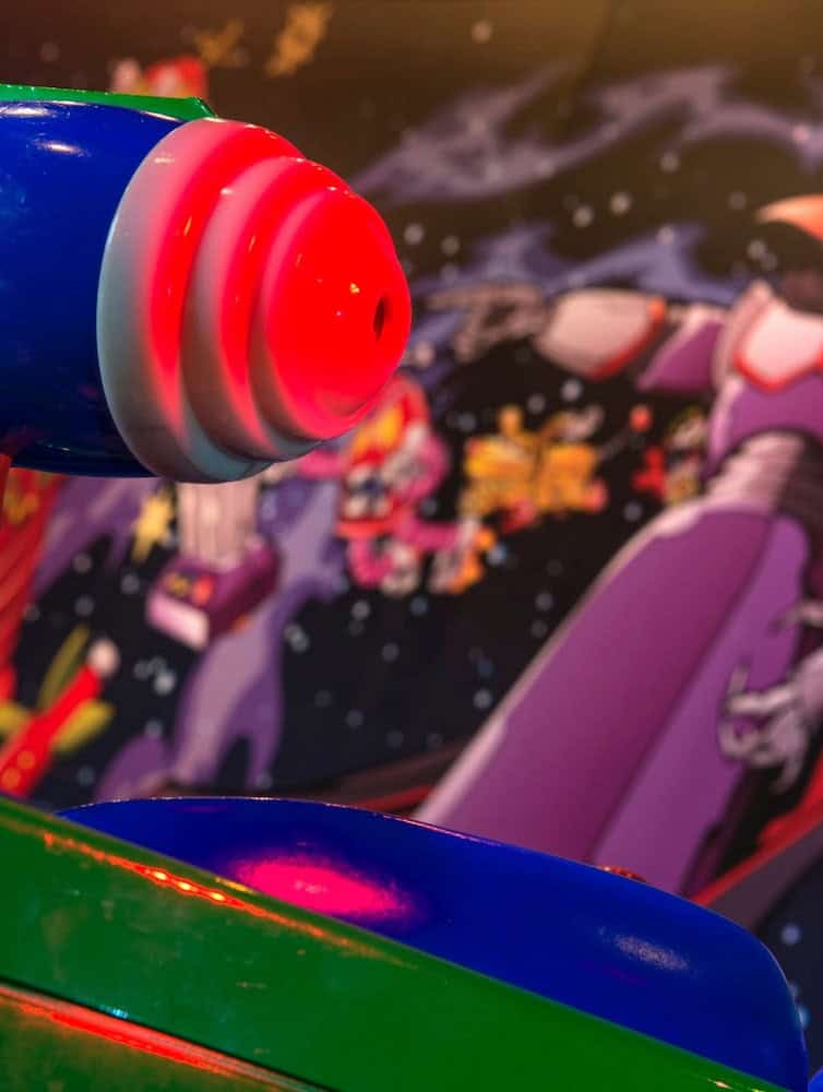 Close-up of a brightly coloured Astro Blaster from Buzz Lightyear Laser Blast, now undergoing refurbishment at Disneyland Paris until the end of 2025