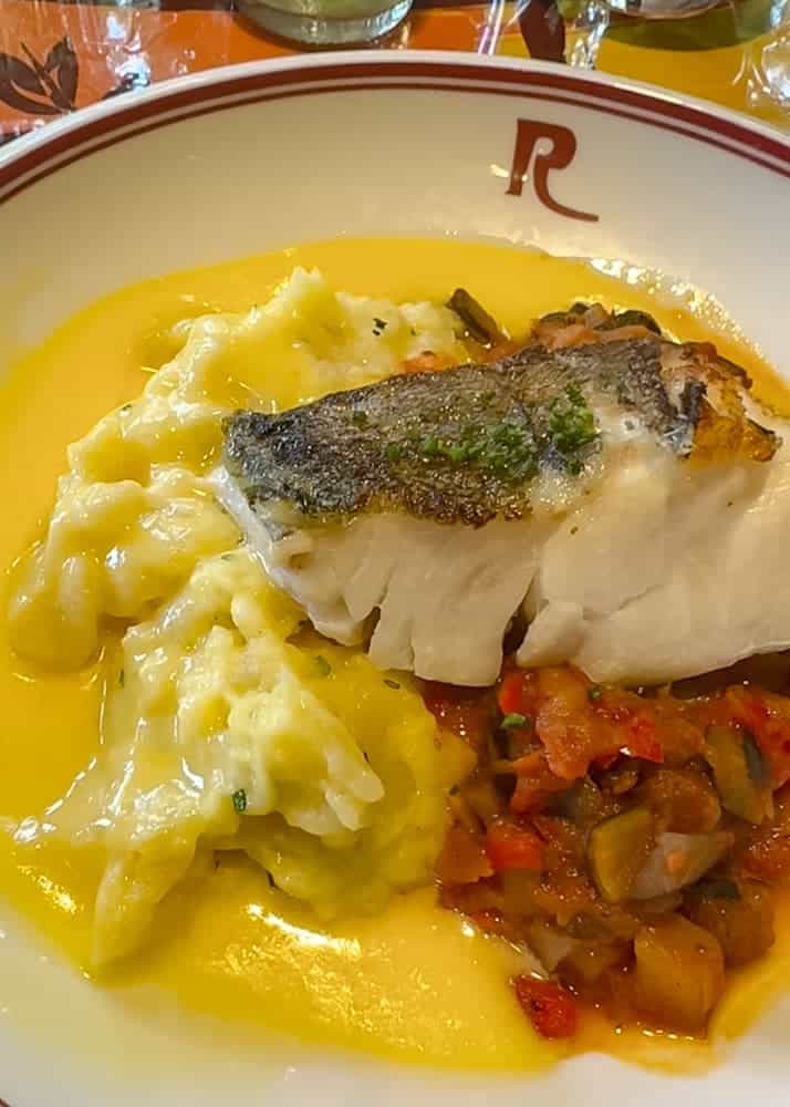 Roast cod with ratatouille and crushed potatoes at Bistrot Chez Rémy Disneyland Paris