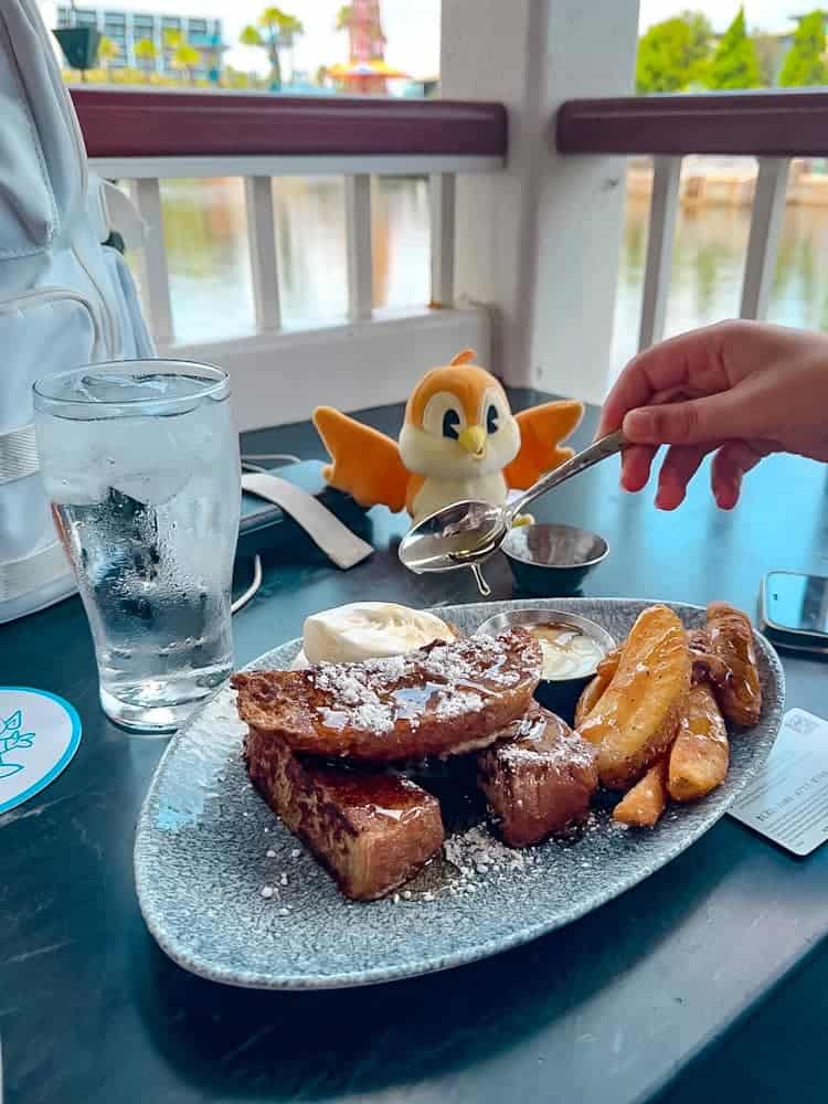 Indulgent children’s French toast with whipped cream from Lamplight Lounge, Disneyland California — a sweet and simple Disney food favourite.