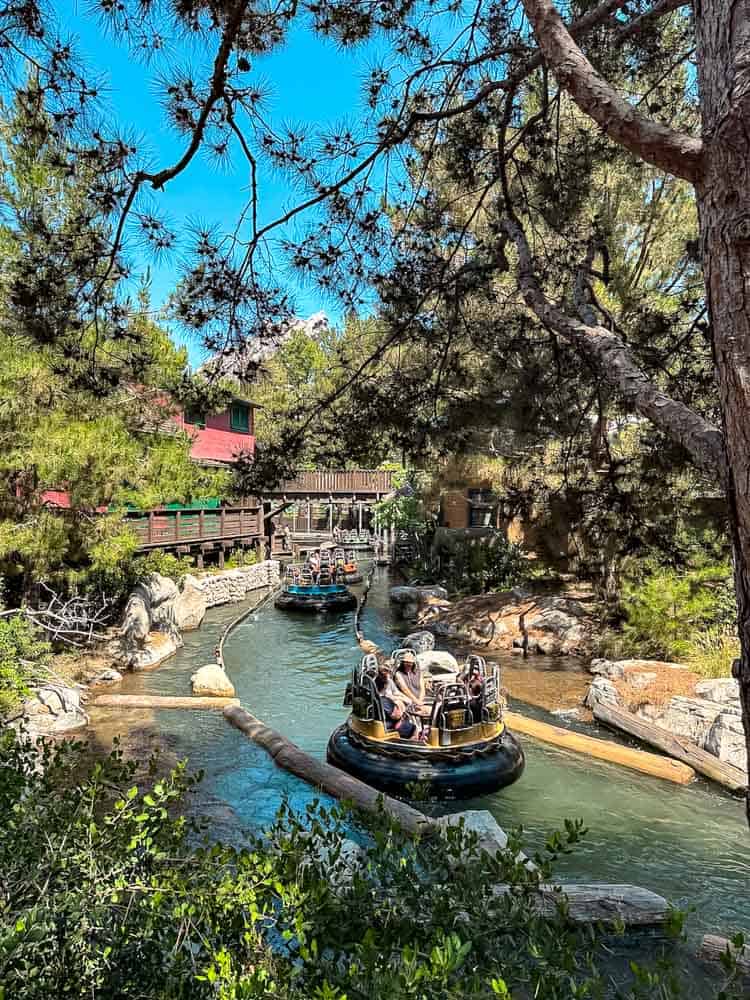 Guests riding Grizzly River Run rapids at Disney California Adventure, a highlight of the 3-Day Disneyland California Itinerary for thrills and water fun.