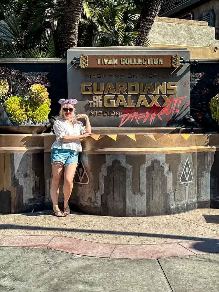 Carrie-Anne in front of the Guardians of the Galaxy: Mission Breakout sign at Disney California Adventure, part of her 3-Day Disneyland California Itinerary.