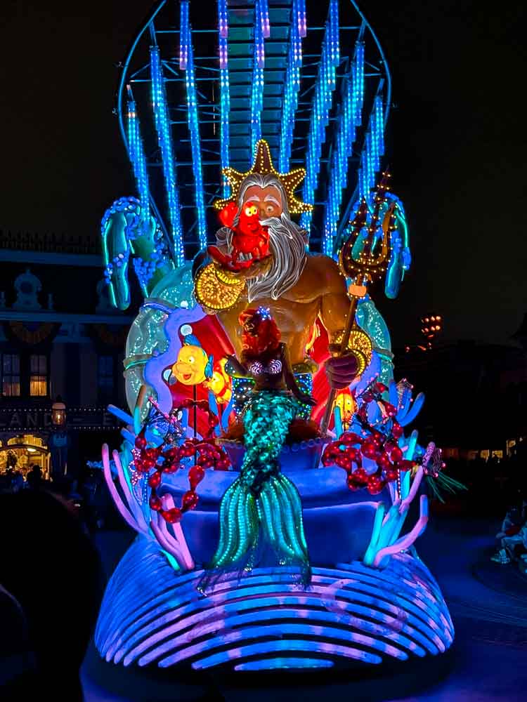 Ariel and King Triton float in the Disneyland night parade, part of a 3-Day Disneyland California Itinerary.