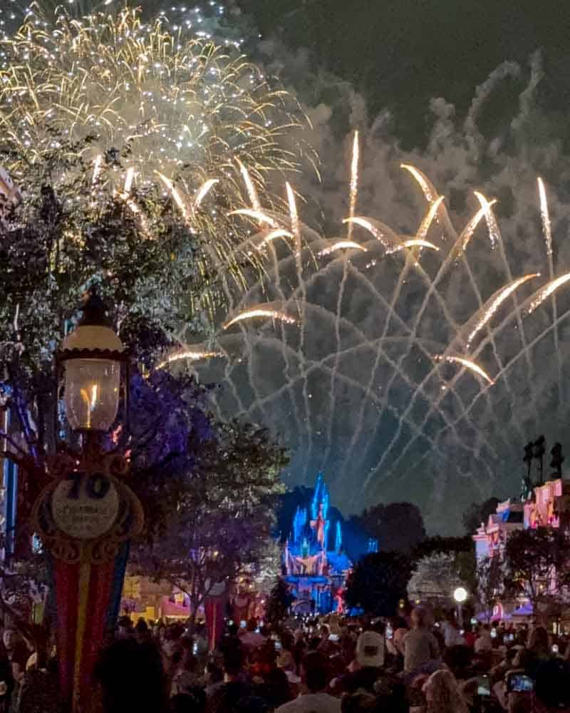 Disneyland fireworks bursting over Sleeping Beauty Castle at night during a 3-Day Disneyland California Itinerary.