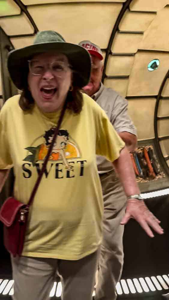 Guest laughing inside Star Wars: Galaxy’s Edge