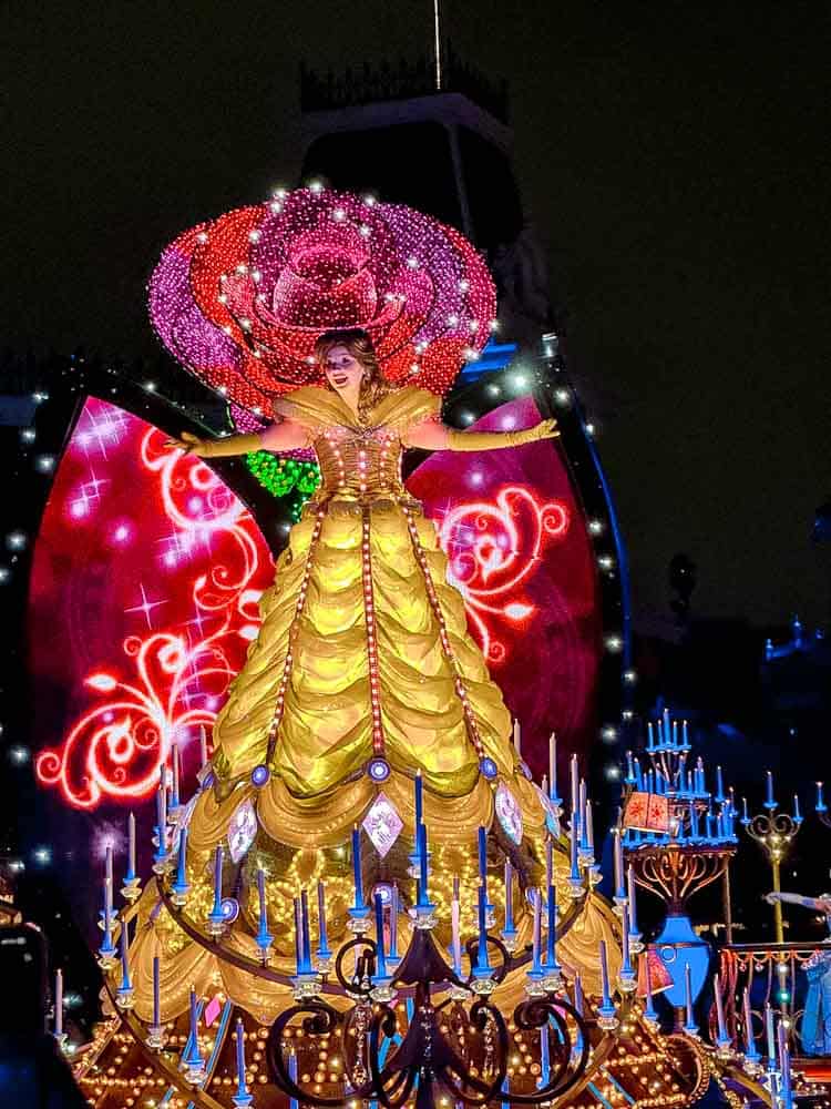 Parade float of Belle in her glowing golden gown during Paint the Night, a dazzling highlight of Carrie-Anne’s 3-Day Disneyland California Itinerary.