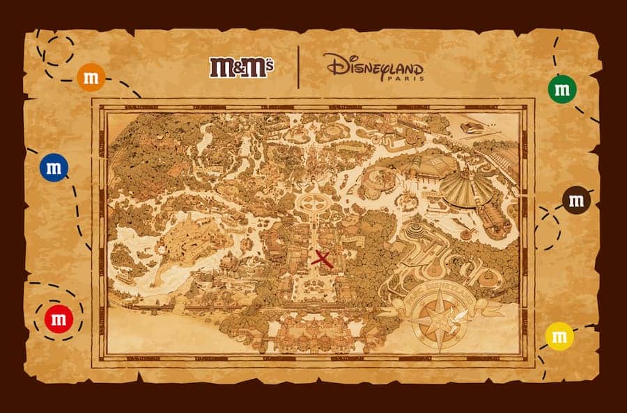 Illustrated treasure map sponsored by M&M’s for the new treasure hunt game during Halloween at Disneyland Paris 2025.