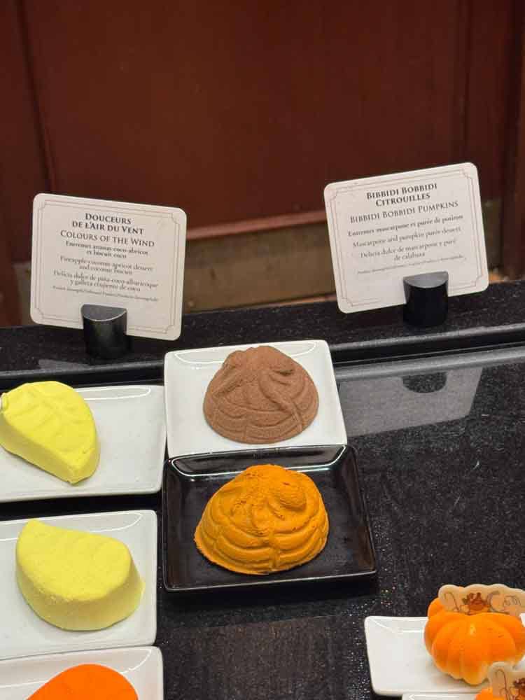 Halloween-themed mousse desserts shaped like pumpkins and spiders served at the Royal Banquet buffet during Disneyland Paris Halloween 2025