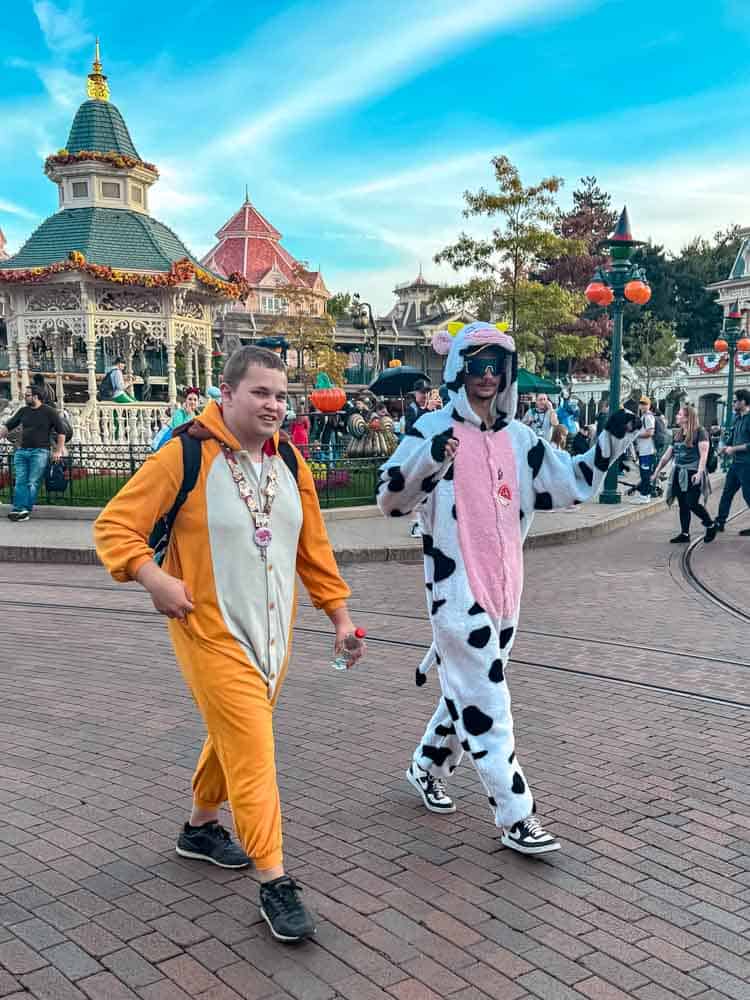 Disneyland Paris adult guests dressed in Halloween onesies during Halloween 2025