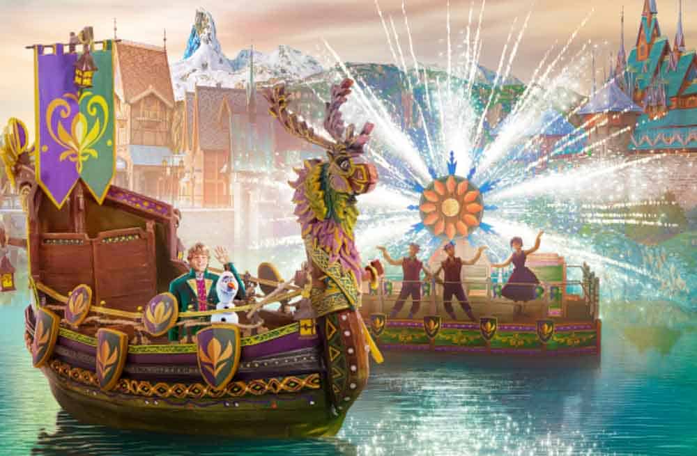Cropped: A Celebration in Arendelle Disneyland Paris show featuring Anna, Elsa, Olaf and performers on Viking longships gliding across the lake with fountains and colourful effects.