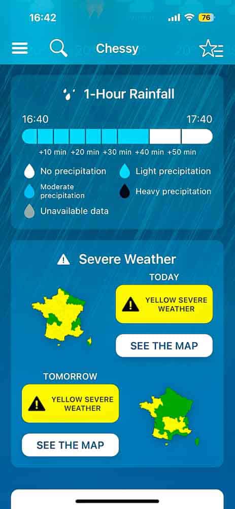 Meteo-France app showing rain radar and severe weather warnings for Chessy, the area around Disneyland Paris.