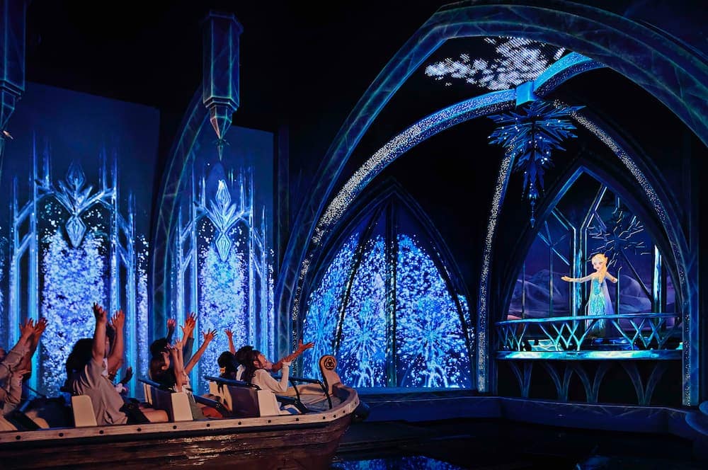 Boat of passengers for the Frozen Ever After ride experience