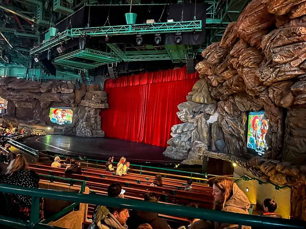Entrance to Videopolis in Discoveryland at Disneyland Paris during January, with guests entering for indoor entertainment.