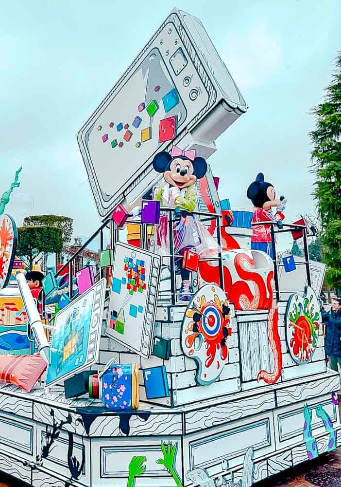 Minnie and Mickey Mouse on a colourful parade float during February at Disneyland Paris for Million Splashes of Colour