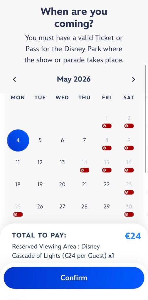 Disney Cascade of Lights reserved viewing calendar in the Disneyland Paris app showing available and unavailable booking dates