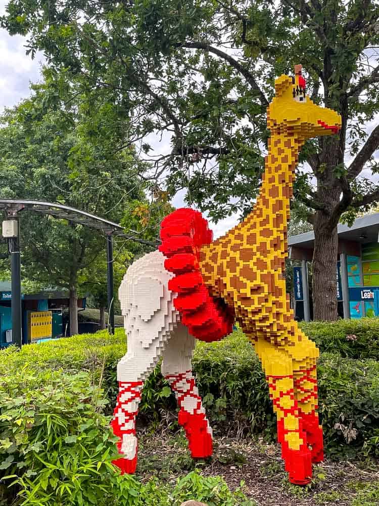 LEGO giraffe wearing ballet slippers at LEGOLAND Windsor, a Merlin theme park affected by Merlin changes RAP Pass rules