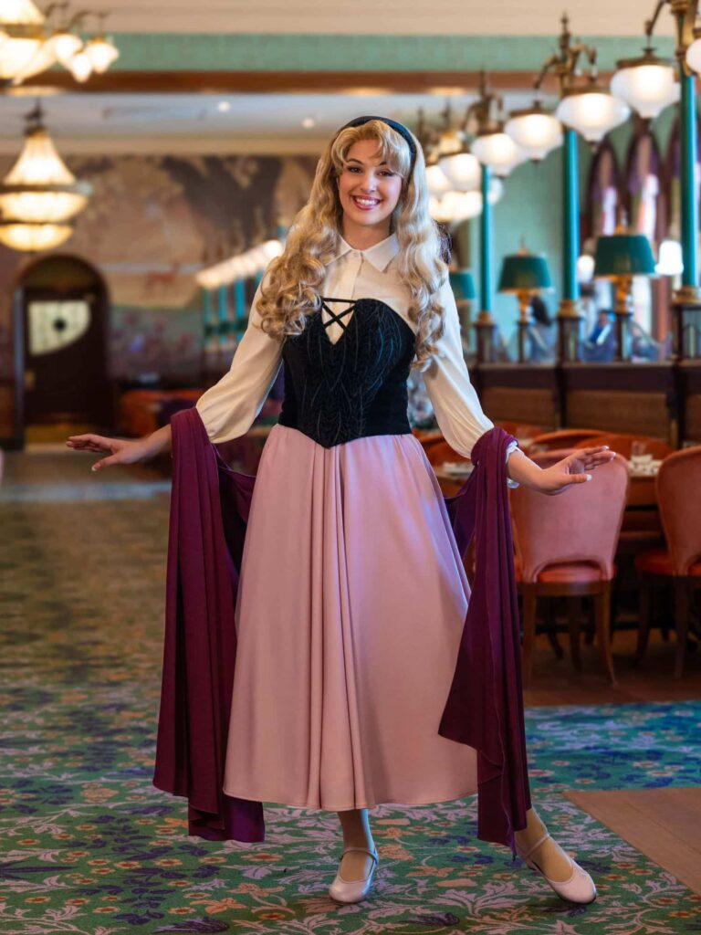 Princess Aurora dressed as Briar Rose in her village outfit appearing at the Regal View princess restaurant in Disneyland Paris