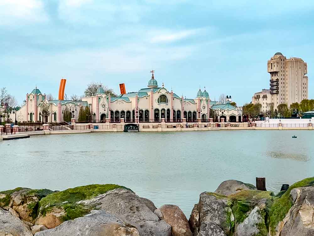 Regal View restaurant by the lake with RC Racer tracks and Tower of Terror visible at Disney Adventure World Disneyland Paris