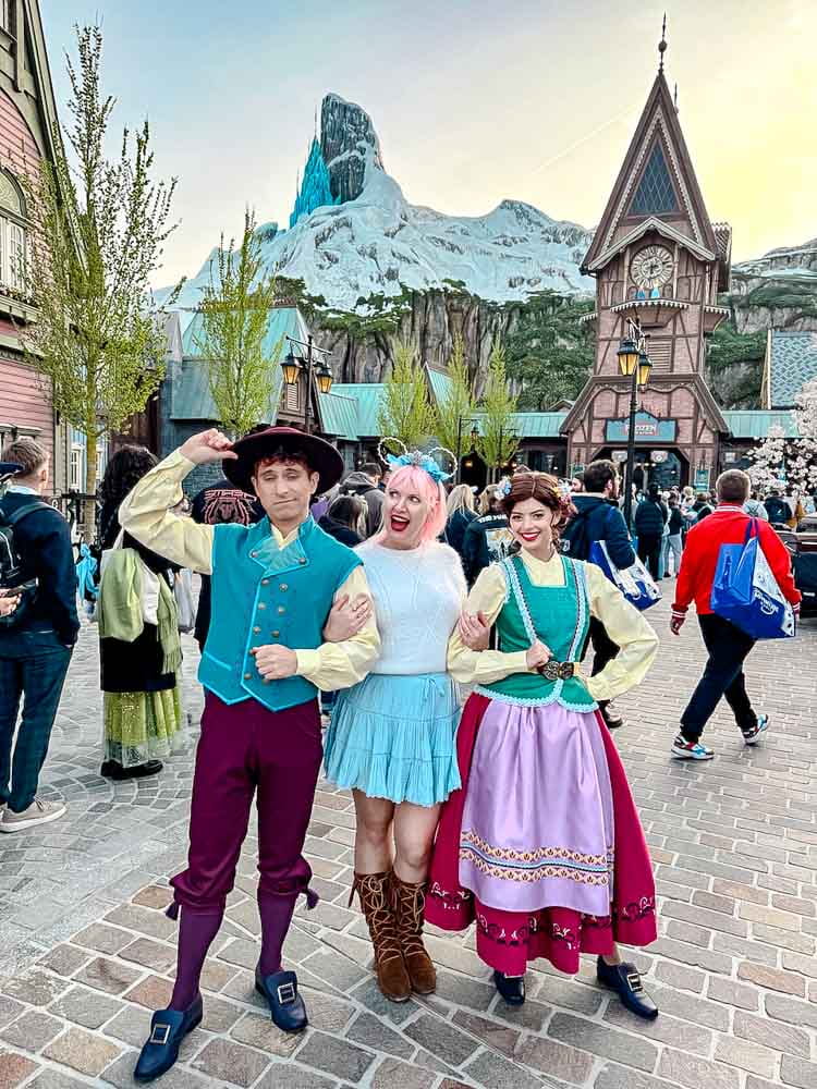 Carrie-Anne Hall and guests interacting with Arendelle citizens in World of Frozen at Disney Adventure World Disneyland Paris