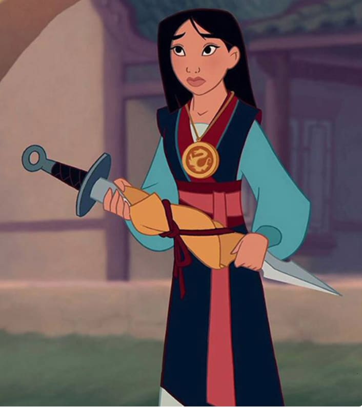 Mulan wearing her red and blue warrior outfit from the animated film, inspiration for the Regal View princess costume