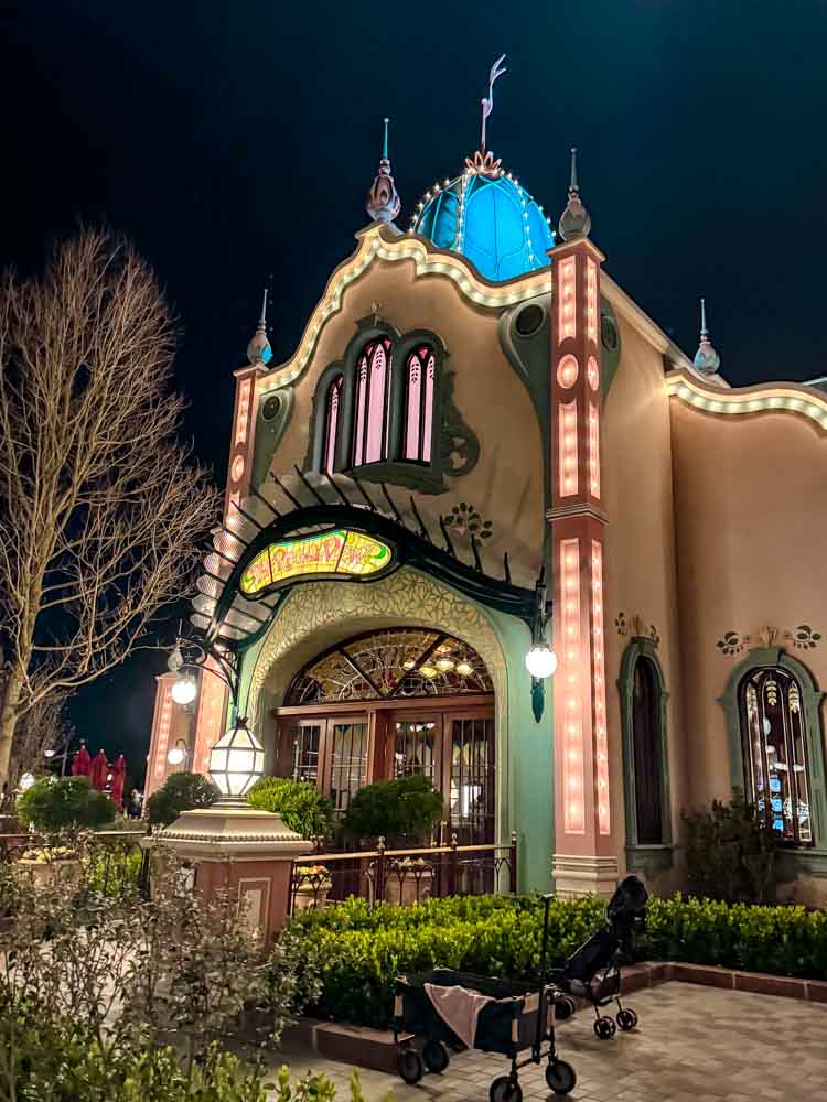 Regal View Restaurant lit up in the evening at Disney Adventure World Disneyland Paris