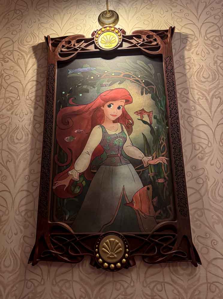 Ariel portrait artwork displayed inside Regal View Restaurant at Disneyland Paris
