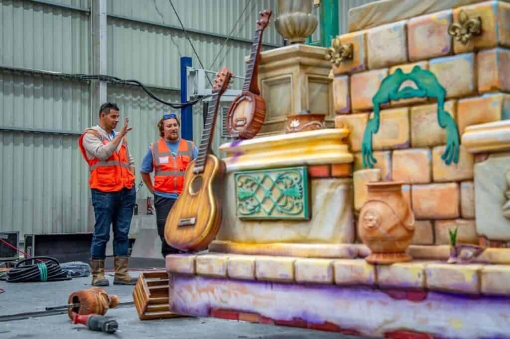 Behind-the-scenes look at a Disney Princess Cavalcade float under construction