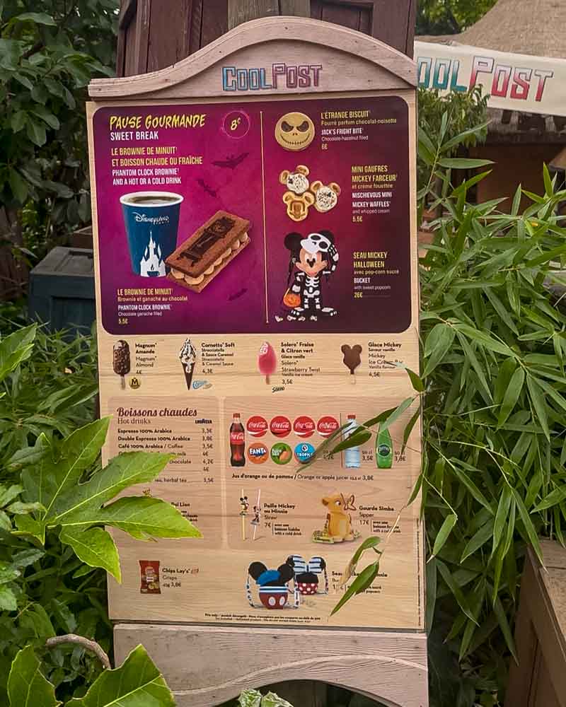 Cool Post snack menu in Adventureland at Disneyland Paris displaying Mickey waffles, Halloween treats and ice creams.